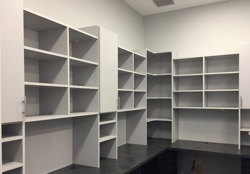 White multi level shelving with desk space - custom office solutions - Lake Charles La - ShelveIt